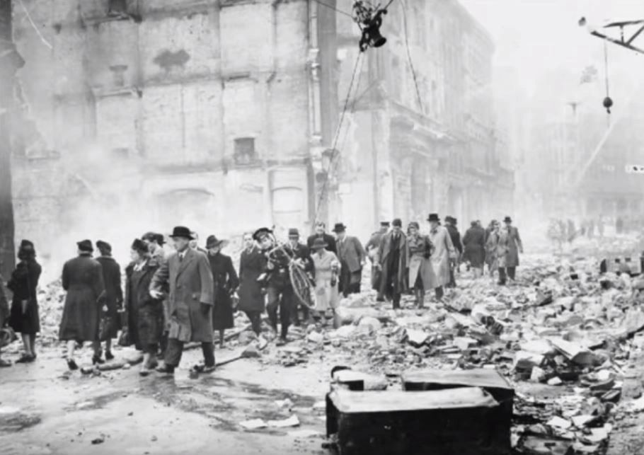 Londoners going about their daily business during WWII bombing